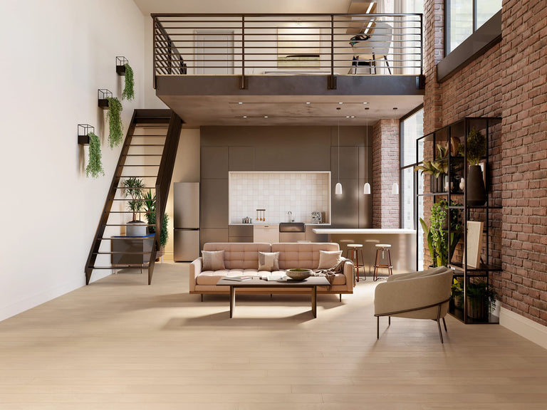 Modern living room with a brick wall, wooden floor, and stylish furniture.